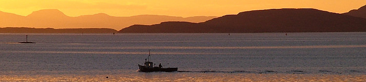 Fishing boat at sunrise